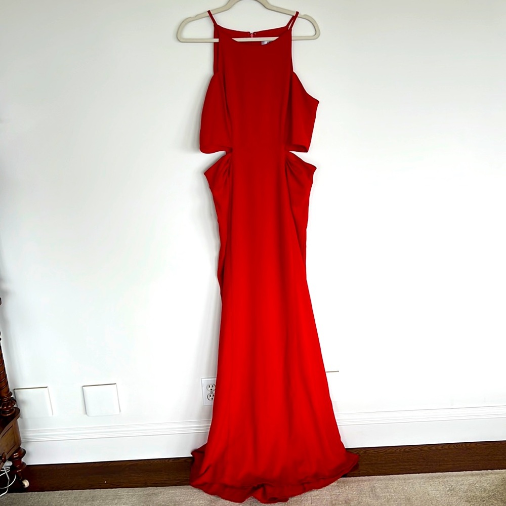 Red floor length gown with cutouts
